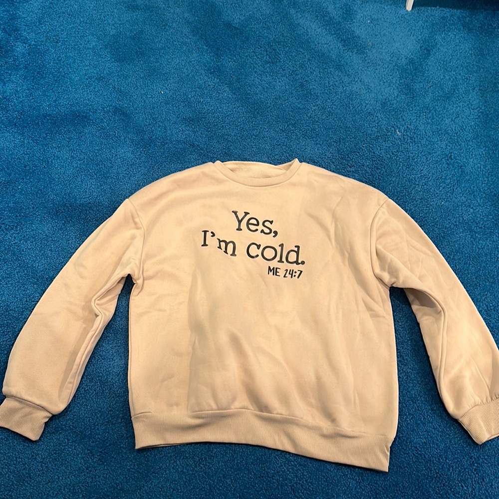 Crew neck, never been worn, fits a little small, soft